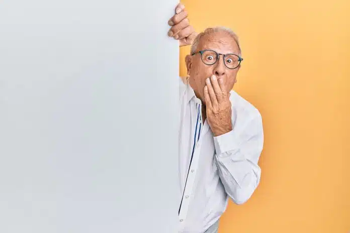 man in white dress shirt wearing black framed eyeglasses